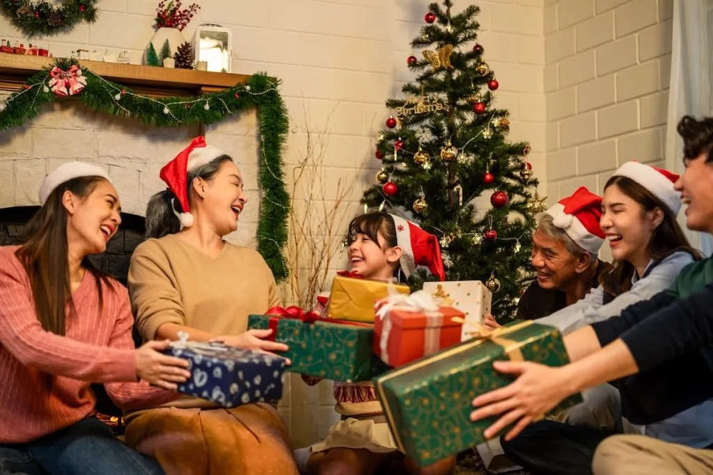 Opening gifts under the Christmas Tree